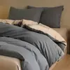 Juego de cuatro piezas de algodón puro cepillado de lujo ligero para otoño e invierno, juego de ropa de cama de tres piezas de color liso bicolor de algodón cálido y grueso