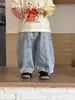 Ropa de Primavera para Bebé 2026 Nuevo Estilo Coreano Ropa Infantil Conjunto de Camiseta con Bloques de Color y Jeans para Niños Venta al por Mayor Personalización