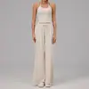Conjunto de yoga falso duas peças com gola halter para mulheres, top regata com bolinhas e color blocking, calça pantalona fluida, conjunto casual para fitness