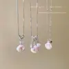 Collar con colgante de concha de hada súper para mujer, nuevo modelo superventas 2026, lujo ligero con sensación de alta gama, cadena larga para la clavícula, accesorio estilo vacacional