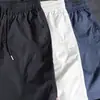 Shorts Esportivos Estilo Americano para Homens, Calças de Meio Comprimento de Verão, Shorts de Cinco Pontos Cortados na Diagonal para Atletismo e Corrida, Shorts de Verão para Homens