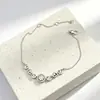 Pulseira Feminina Fina de Dois Tons Dourado e Prata com Zircônia Microincrustada Estilo Simples Europeu e Americano Nicho Versátil Acessórios de Pulseira