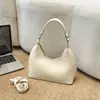 Bolso cubo minimalista de mano, nuevo modelo primavera 2026, alto atractivo estético, bolso de hombro moderno y elegante, bolso cruzado de moda nicho