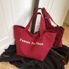 Bolso de Lona Rojo Ins Niche 2026 Nuevo Bolso de Hombro de Lona Casual con Estampado de Letras Gran Capacidad Bolso para Estudiantes