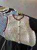 Chaleco de encaje a cuadros de punto hueco retro estilo japonés con botones para mujer, chaqueta suéter sin mangas que reduce la edad para otoño