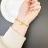 Pulsera de oro de arena de Vietnam marea nacional color esmalte mariposa flor pulsera nuevo diseño chino sentido joyería al por mayor