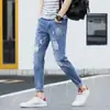 Jeans skinny ajustados de moda estilo coreano para hombre, pantalones casuales elásticos rotos cropped para hombres jóvenes