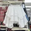 Saia Irregular de Renda Splicing Estilo Coreano que Cobre a Barriga para Mulheres Nova Coleção Primavera e Verão 2026 Saia Curta Linha A Gentil Anti-Exposição