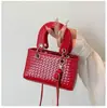 Bolso pequeño tejido estilo coreano para mujer, nuevo modelo 2026, patrón tejido, de un solo hombro, adecuado para el trabajo y los desplazamientos, bolso pequeño cuadrado cruzado
