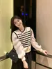 Chaleco de punto a rayas blancas y negras con mangas abullonadas, un top de manga larga de estilo dos piezas para mujer, suéter estilo coreano para primavera y otoño 2026