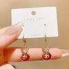 Pendientes de estilo chino con forma de bolso festivo rojo, con hebilla para las orejas, de nicho, ligeros, de lujo, de celebridades de Internet, de moda, joyería de alta gama.