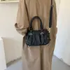 Bolsos de mujer de nicho 2026 nueva moda bolso tote plisado bolso de hombro con un toque elegante de alta gama bolso cruzado