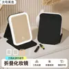 Espejo de maquillaje plegable de alta relación costo-rendimiento con luces LED, portátil y asequible, un producto popular de comercio electrónico, disponible para venta al por mayor