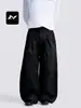 Con una rica hoja occidental curva simple retro americana para hombres y mujeres pantalones de pierna ancha diseño de pliegues holgados sentido de diseño corte tridimensional