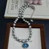 Socialité Frances Colgante Oval de Cristal Azul Marino Collar de Perlas para Mujer Lujo Ligero Nicho Gama Alta Elegante Cadena para Clavícula