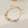 Nova Pulseira de Moeda Estilo Chinês Micro-Incrustada com Zircônia para Mulheres, Luxo Leve, Nicho, Requintada, de Alta Qualidade, Fashion, Versátil, Joia de Mão Elegante