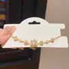 Pulsera Gatito Flor Zircón Lujo Accesible Bañada en Oro Real de 18 Quilates Moda Exquisita Elegante Joyería de Mano de Nicho de Alta Gama para Mujeres