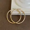 Pendientes de aro geométricos retorcidos de metal liso estilo Ins para mujer, simples, para el trabajo, con temperamento, versátiles, modernos, pendientes de moda, joyería para orejas