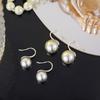 Selección estricta de joyería plata 925 australiana blanca clásica pendientes redondos de bola tacones altos ganchos para la oreja pendientes de perlas 650 perlas