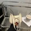 Bolso de Color Sólido para Mujer 2025 Nuevo Nicho Tendencia de Moda Verano Bolso Sobaco Estilo Occidental Casual Un Hombro Bandolera