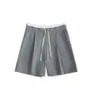 Estilo minimalista traje gris shorts negros mujer verano diseño de cordón cintura alta corte ajustado pantalones de longitud media shorts mujer talla grande