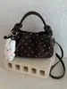 Bolso plisado de nicho súper popular para mujer, nuevo bolso cruzado versátil de moda 2026, exquisito bolso de mano tipo dumpling, bolso tote pequeño