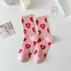 Calcetines rosas de mujer primavera y verano tendencia coreana calcetines simples de tubo Joker calcetines lindos con flores y letras de personalidad al por mayor