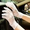 Verano damas delgadas encaje protector solar cortos para conducir protección UV guantes novia etiqueta guantes negros ventas directas de fábrica