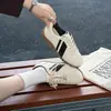 Zapatillas de entrenamiento alemanas súper elegantes y modernas de cuero suave para mujer, nuevo modelo 2026, zapatos blancos ligeros de suela blanda, zapatillas casuales versátiles y cómodas