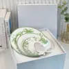 Serie Lirio del Valle Hotel Hueso Verde Porcelana Plato de Cena Occidental Taza y Platillo Juego Plato para Filete Plato de Postre Taza de Café y Platillo Vajilla