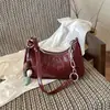Bolso para Mujer 2026 Temporada de Verano Nuevo Estilo Coreano Simple Bolso de Hombro Único para Debajo del Brazo Bolso de Mano para Dama PU Brillante con Patrón de Cocodrilo