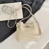 Bolso pequeño retro muy elegante para mujer, nuevo bolso cruzado de moda primavera 2026, exquisito bolso de hombro para debajo del brazo, bolso tipo cubo