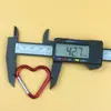Ventas Directas de Fábrica Aleación de Aluminio No. 5 Mosquetones de Corazón Coloridos 42*40mm Hebilla de Corazón de Durazno para Exteriores Gancho para Mochila de Montañismo