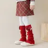 Nuevos estilos de otoño e invierno: calcetines largos engrosados con adorno de lazo para niñas, perfectos para Año Nuevo, proporcionando calor y actuando como calentadores de rodillas y piernas