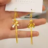 Aretes Chapados en Oro con un Diseño de Moda Único con Estrellas y Notas Musicales, un Accesorio Sencillo de Estilo Largo para Niñas, con Borlas Doradas para un Aspecto Elegante