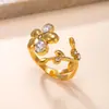 Anillo Popular Transfronterizo de Acero Inoxidable, Estilo Lujo Ligero, Chapado en Oro de 18 Quilates, Diseño de Flor Fundida, Anillo Abierto de Acero de Titanio Fábrica