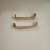Venta al por mayor del fabricante Accesorios de ferretería para equipaje Hebilla de puente Gancho para correa de hombro Cierre de mango de metal
