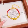 Pulseira Popular Xiaohongshu de Peixe Koi Pequeno Banhada a Cobre Dourado com Fio Vermelho, com Strass e Moedas Douradas Tecidas no Fio, uma Pulseira Atratora de Riqueza para o Ano de Nascimento