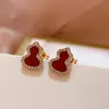 Versión alta dorada V de los pendientes de calabaza Kira para mujer, pendientes colgantes de alta gama, pendientes de diamante de fritilaria blanca natural, suministro de fabricantes