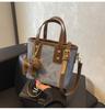 Bolso de Mujer Nuevo Estilo Transfronterizo 2026 Bolso Cubo Más Vendido Otoño e Invierno Bolso de Hombro Cruzado de Nicho Bolso de Mano de Alta Gama