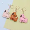 Llavero creativo de perro para coche con impresión a doble cara, colgante para mini bolso para hombres y mujeres, exquisito accesorio de llavero de cachorro