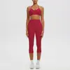Conjunto deportivo de yoga con sujetador de yoga sin costuras de nuevo estilo transfronterizo con relleno incorporado, alta elasticidad, secado rápido y pantalones capri para correr