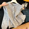 Cárdigan suéter 2026 primavera y otoño estilo nuevo tejido de punto color liso abrigo exterior top elegante con lazo diseño simple