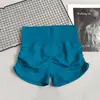Shorts de Yoga Europeus e Americanos para Levantar o Bumbum, Pêssego Elástico, Cintura Alta, Controle da Barriga, Calças Apertadas, Alta Elasticidade, Esportes de Corrida, Secagem Rápida, Hot Girl