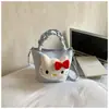Versión Coreana Caricatura Anime Niños y Niñas Bolso de Mano Lindo Gato Muñeco Bolso de Hombro para Bebé 2026 Nuevo Bolso Infantil