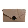 Bolsos de Nicho Franceses de Alta Gama Primavera 2026 Nuevo Bolso de Sobre para Mujer Versátil Moda Tendencia Bolso Pequeño Cruzado