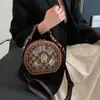 Bolso Redondo Pequeño de Moda de Gama Alta para Dama 2026 Nuevo Bolso de Mano con Estampado Retro Bolso Cruzado de Hombro Único Versátil Casual