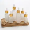Venta al por mayor de fábrica botella transparente esmerilada de 30 ml para aceite esencial botella cosmética nueva botella con gotero de cabeza de plástico Botella secundaria para loción