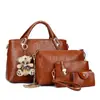 Bolsa de mão feminina verão novo conjunto de quatro peças bolsa de mãe urso transversal bolsa feminina uma geração de cabelo