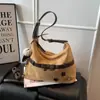 Moda de moda Versátil Gran capacidad Bolso de hombro Bolsos de alta gama Bolso de mano para el trabajo Bolso cruzado único de nicho elegante